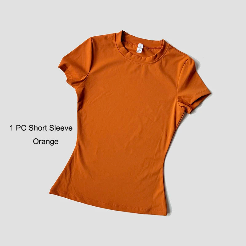 Conjunto de Yoga Esportivo Feminino Sem Costura, em Malha, para Academia, Fitness, com Top Cropped de Manga Curta e Legging Curta.