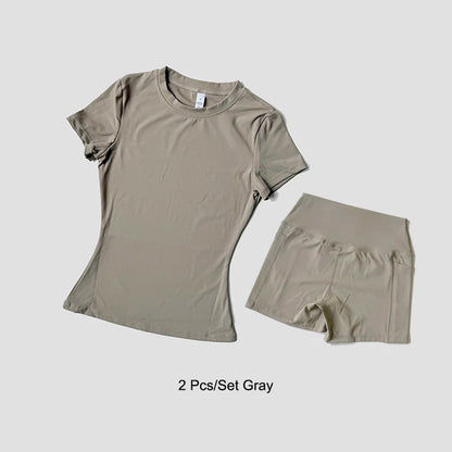 Conjunto de Yoga Esportivo Feminino Sem Costura, em Malha, para Academia, Fitness, com Top Cropped de Manga Curta e Legging Curta.