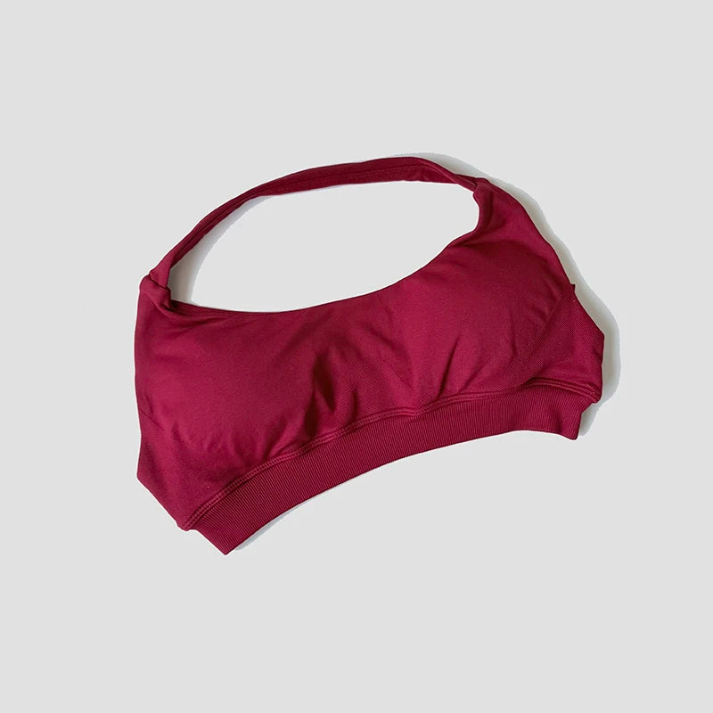 Sutiã esportivo sem costura com alças halter, top cropped sexy com bojo nas costas para yoga e academia.