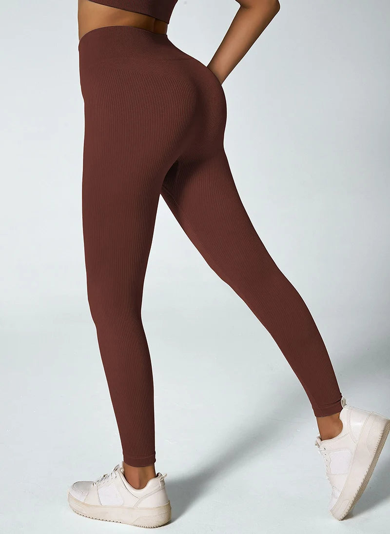 Calça legging feminina de ioga sem costura, em malha tricotada, cintura alta, para esportes, que modela o quadril, ideal para corrida, treino e afinamento da silhueta.