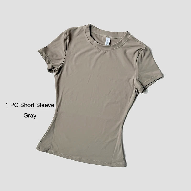 Conjunto de Yoga Esportivo Feminino Sem Costura, em Malha, para Academia, Fitness, com Top Cropped de Manga Curta e Legging Curta.