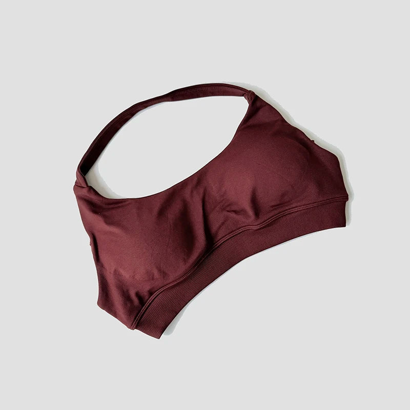 Sutiã esportivo sem costura com alças halter, top cropped sexy com bojo nas costas para yoga e academia.