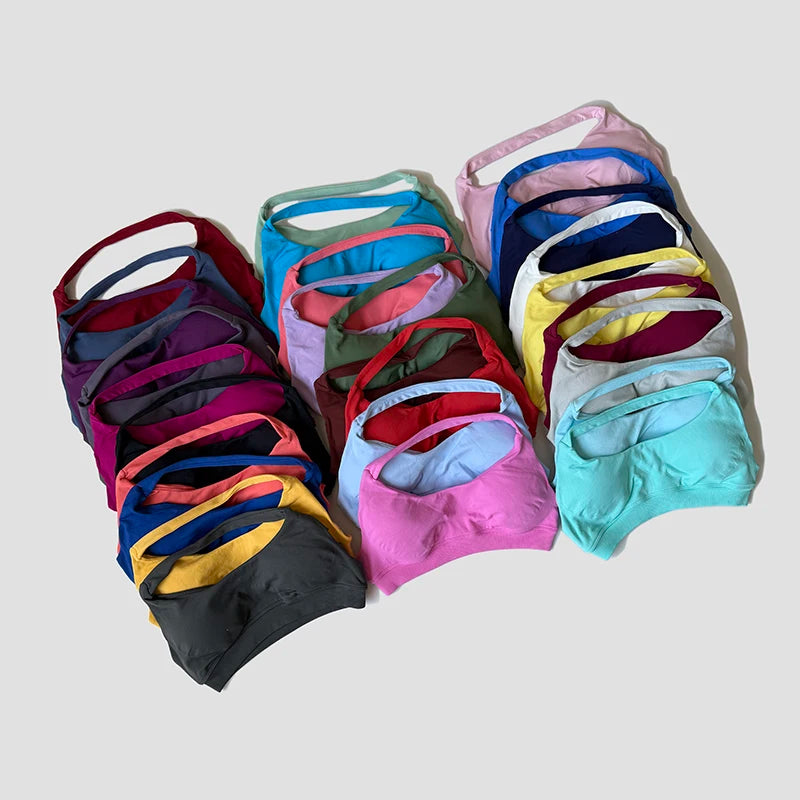 Sutiã esportivo sem costura com alças halter, top cropped sexy com bojo nas costas para yoga e academia.