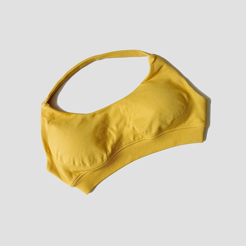 Sutiã esportivo sem costura com alças halter, top cropped sexy com bojo nas costas para yoga e academia.