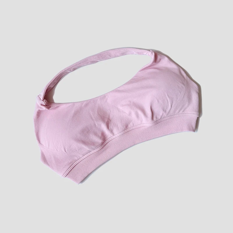 Sutiã esportivo sem costura com alças halter, top cropped sexy com bojo nas costas para yoga e academia.