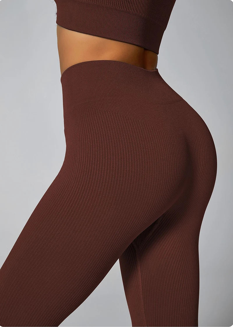 Calça legging feminina de ioga sem costura, em malha tricotada, cintura alta, para esportes, que modela o quadril, ideal para corrida, treino e afinamento da silhueta.