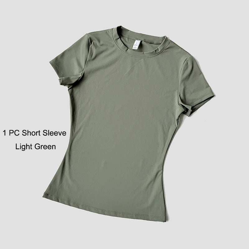 Conjunto de Yoga Esportivo Feminino Sem Costura, em Malha, para Academia, Fitness, com Top Cropped de Manga Curta e Legging Curta.