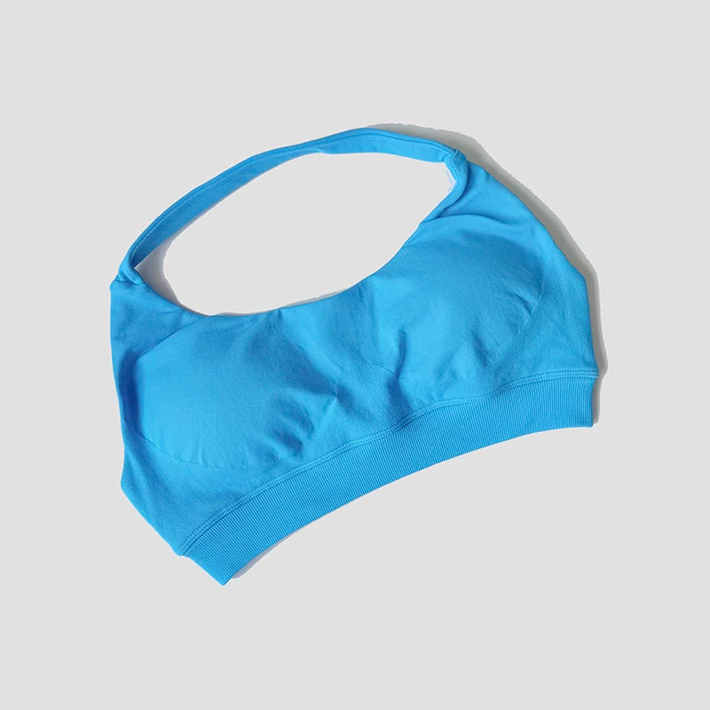 Sutiã esportivo sem costura com alças halter, top cropped sexy com bojo nas costas para yoga e academia.